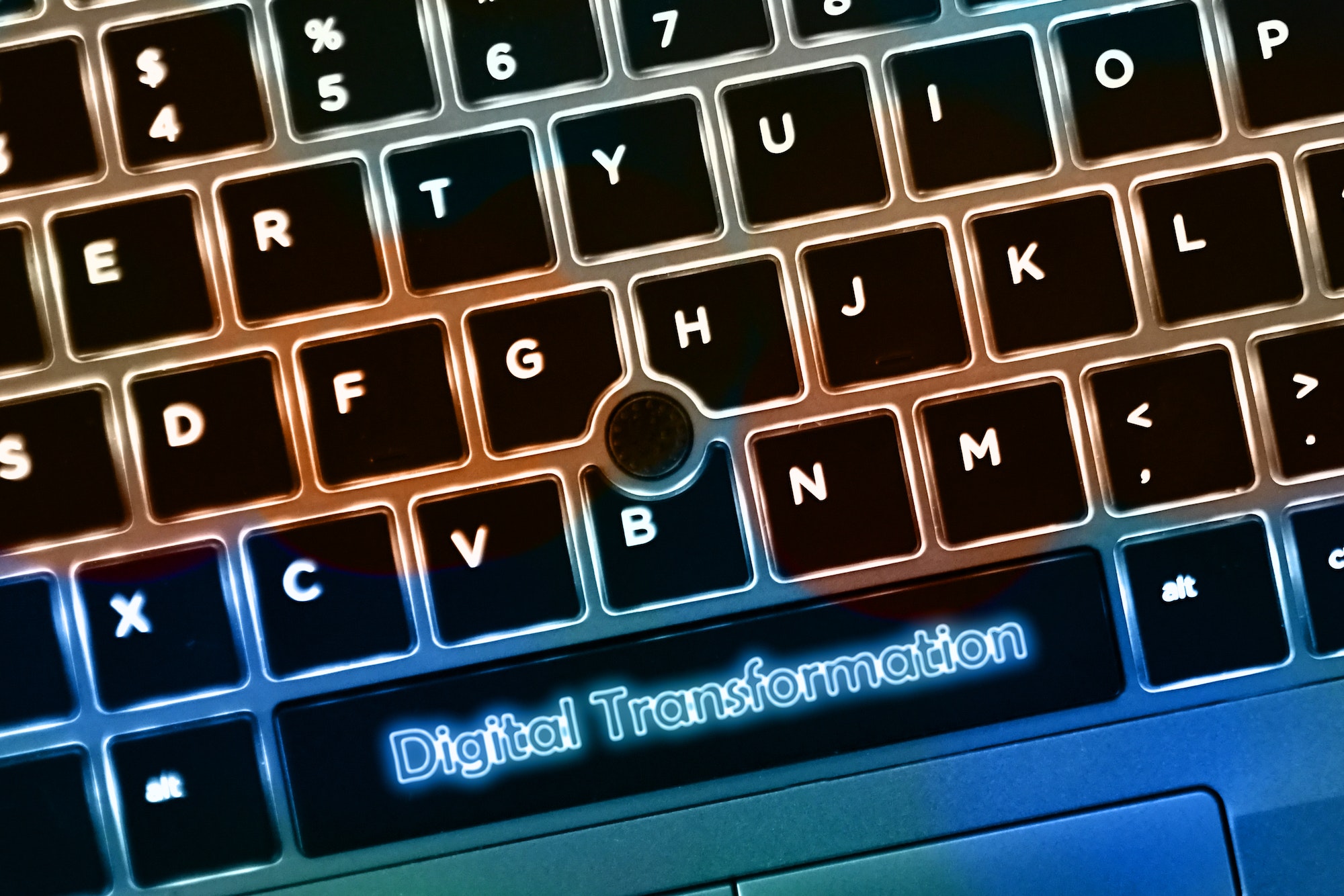 Digital Transformation concept - laptop computer keys